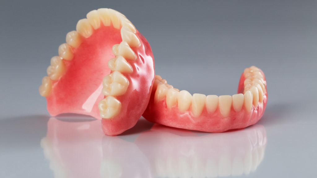 patient has fixed artificial teeth